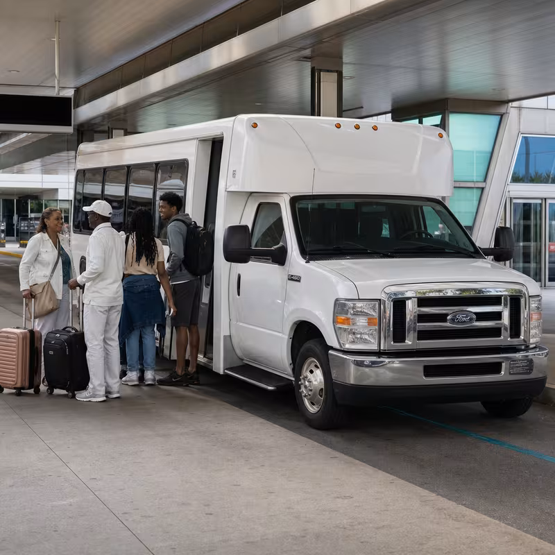 Black Mercedes Sprinter van staged for an Arlington Airport Transportation group