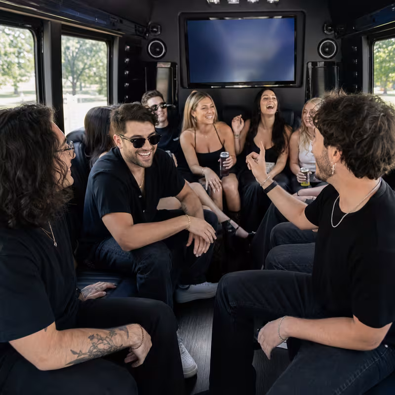Group boarding a white charter bus for Concert Transportation transportation in Arlington